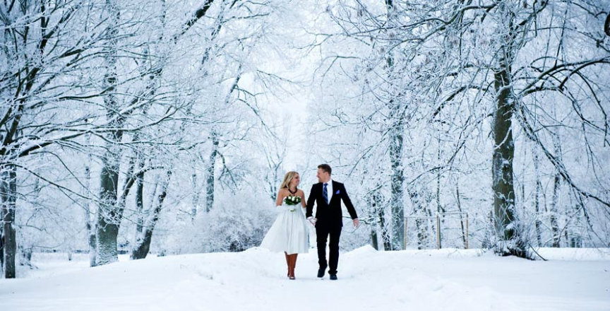 Bride and Groom Walking in Snow